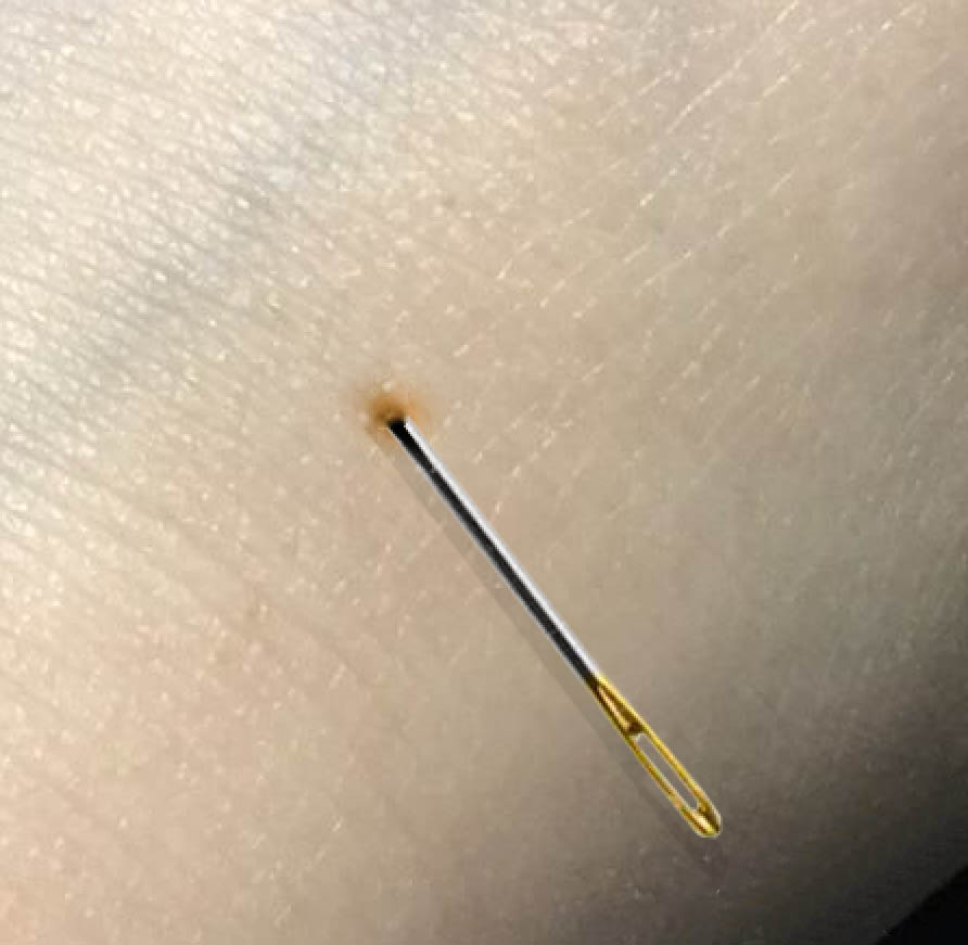 PS怎么合成把针穿进手背的图片效果?